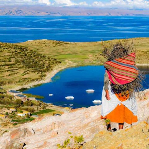 Lady walking near Titi-Caca Lake.