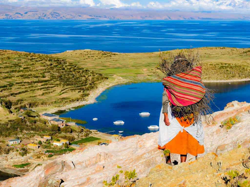 Lady walking near Titi-Caca Lake.